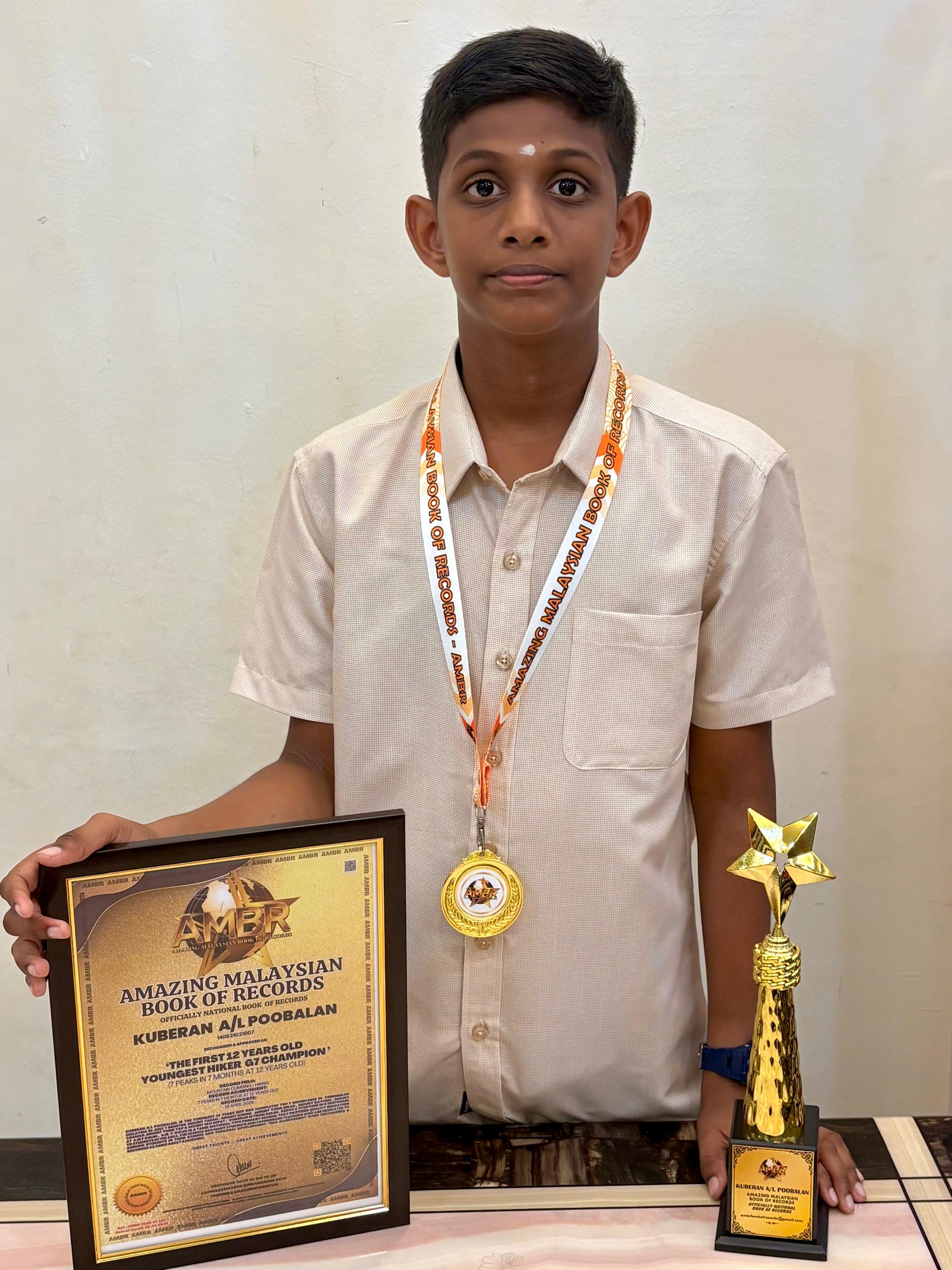 தீபகற்ப மலேசியாவின் ஜி7 சிகரங்களைத் தொட்ட இளம் மலையேறி இளைஞர்